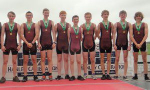 The J16 boys eight on the podium (l to r): Philip Buckley, Mark Ryder, Shane O'Halloran, Daragh Coughlan, David Young (cox), Thomas Power, Brian Maye, Robert McInerney, Luke Mulliez